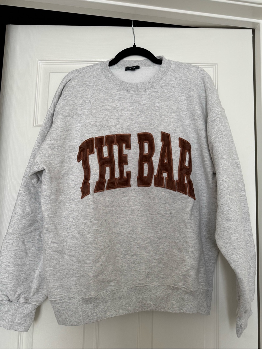 The Bar Gray Crewneck Sweatshirt with Brown Appliqué Logo